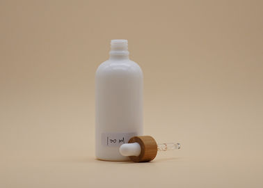 O conta-gotas de vidro branco da forma do cilindro engarrafa 100ml para o empacotamento cosmético