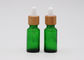 Garrafas de vidro cosméticas verdes do conta-gotas do óleo 18mm com a pipeta de bambu da impressão do conta-gotas
