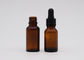 Uso material de vidro ambarino das garrafas do conta-gotas do óleo essencial para o óleo dos cuidados com a pele
