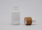A aromaterapia de vidro branca da porcelana engarrafa 30ml com o conta-gotas branco de bambu