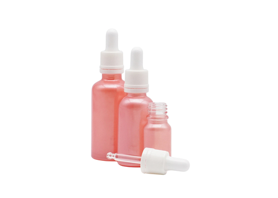 Cuidados pessoais cor-de-rosa de vidro cosméticos vazios da cor das garrafas do óleo essencial de 50ml 100ml